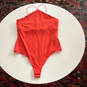 Women’s strapy body suit. Worn once.